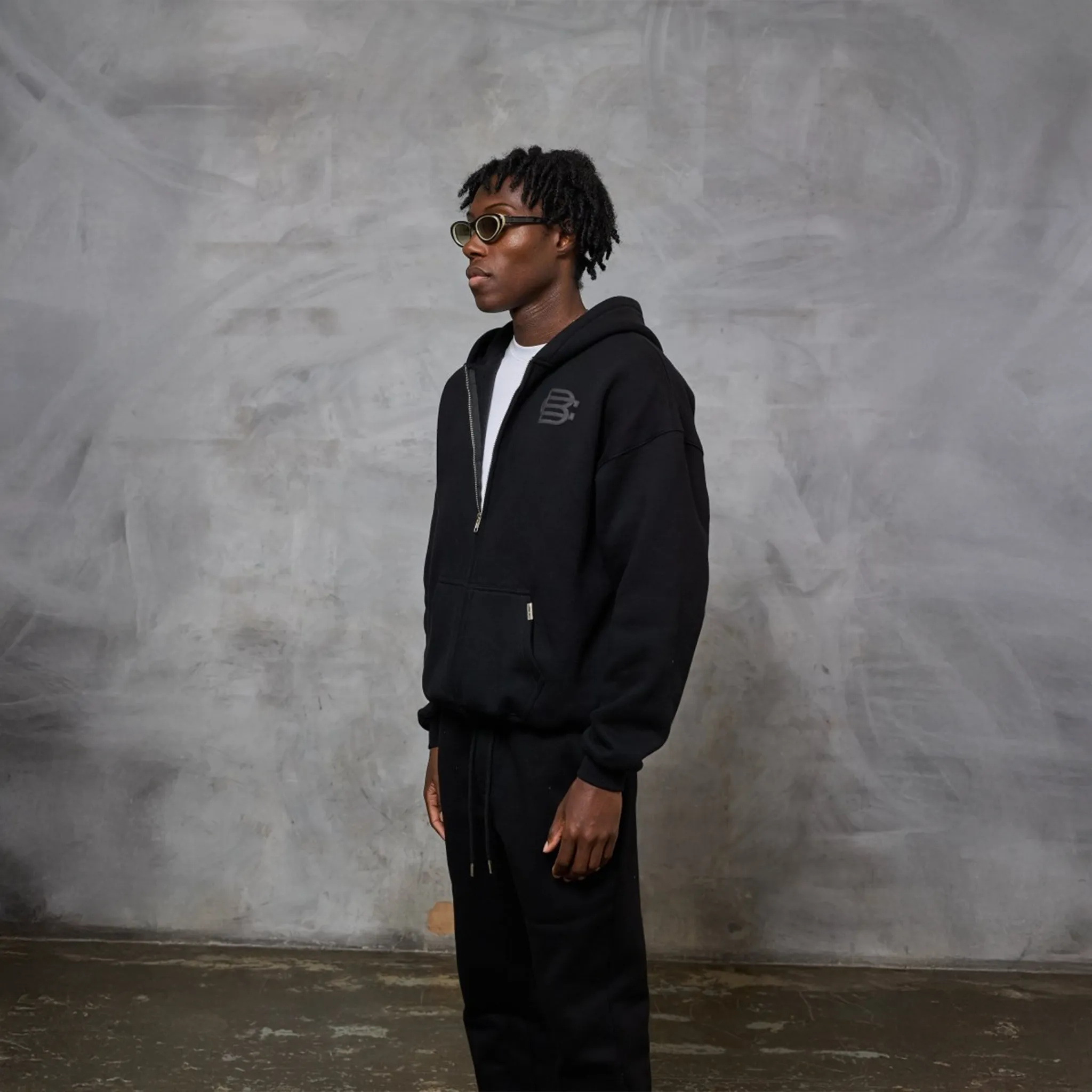 Side View of Bénir Clothing Bénir Club Match Day Matte Black Zip-Up Hoodie PUFFZIPHUDBLK